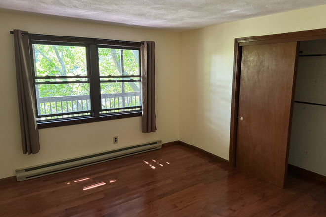 Bedroom - Malden Apartment 1 Bed / 1 Bath Includes: Parking, Laundry, Deck, Fireplace, Dishwasher/Disposal