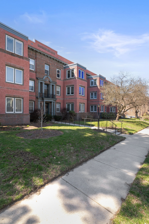 gorgeous brick building - Beautiful Furnished Condo near Brown on Blackstone Blvd