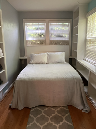 Bedroom with bed, gray walls, this room is attached to the bathroom - Private suite - 18 minute Uber to GU - Gorgeous! Flash sale!