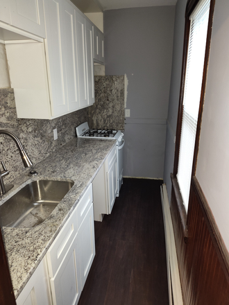 Kitchen - LOCATION! LOCATION! LOCATION! NEAR THE TRAIN STATION, AND BUS LINE Apartments