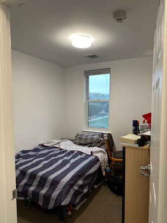 Bedroom - South Campus Commons 4-bedroom 2-bathroom Apartments