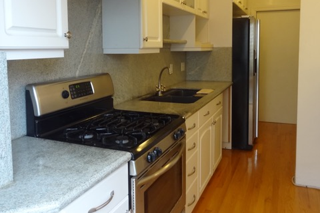 open kitchen - Across the street from campus. 1-bdrm furnished apartment. Washer/dryer in unit.Completely renovated