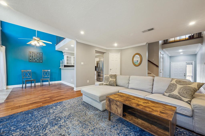 Living Area - Half Bath located off Kitchen - Montrose 2 Bed/2.5 Bath Townhouse