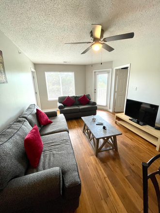 Living Room - 4beds 4bath Near NCSU Campus Condo