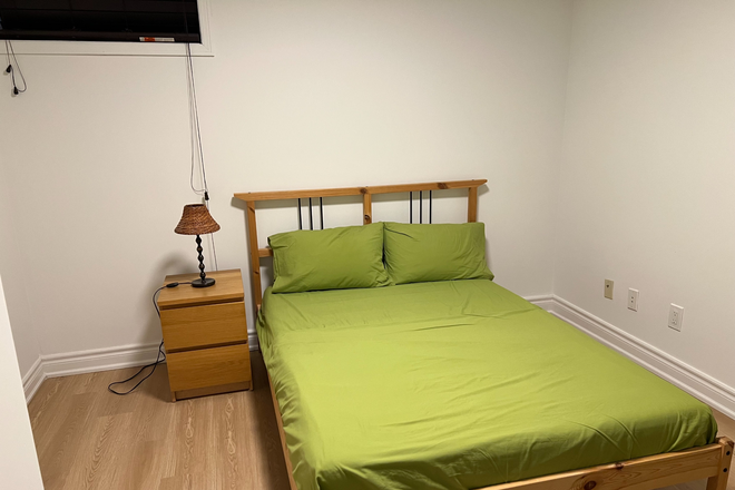 Bed and side table with a table lamp - For Girls: Safe Furnished 3 Bed rooms + kitchen/Laundry in house near U 0f T