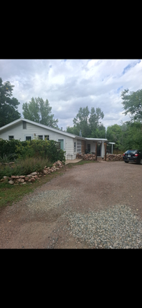Outside street view of triplex - Quiet neighborhood basement apartment