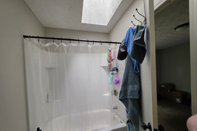 shower/bath and skylight (will not be decorated) - home in this general area