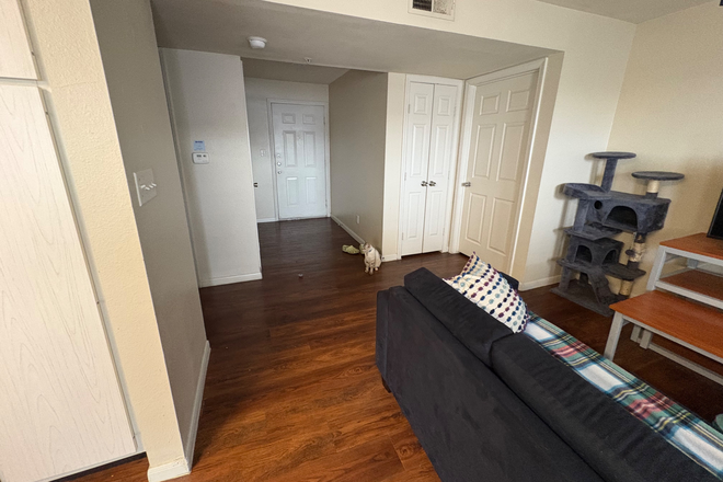Entry way left and right sides lead to restrooms and bedrooms. Washer and dryer next to the front door. - Crossing Place Apartments