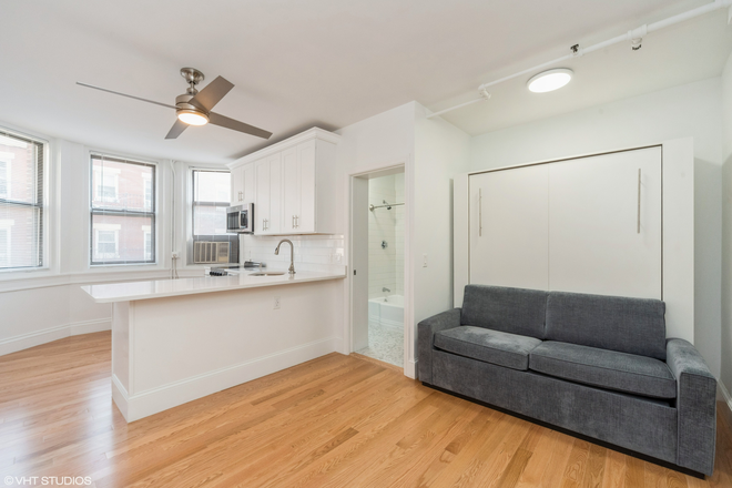bed - Studio In Symphony Apartments