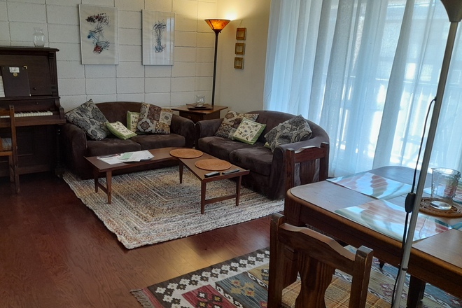 Living and dining room - charming, furnished, fantastic location, top floor, parking wifi utilities included, from owner Condo