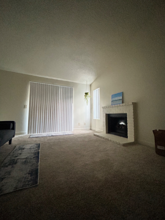 Living room - Looking for one grad student girl to share an apartment