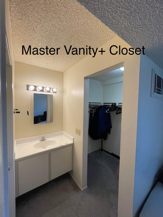 master vanity and walk in closet - Master bedroom available in a summer sublease at Canyon Park