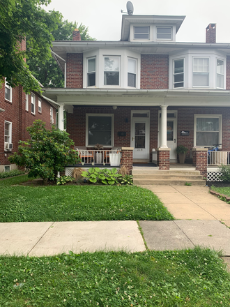 front of house and porch - Newly Renovated 3 bed house with fenced in yard. Only 6 minutes from hospital.