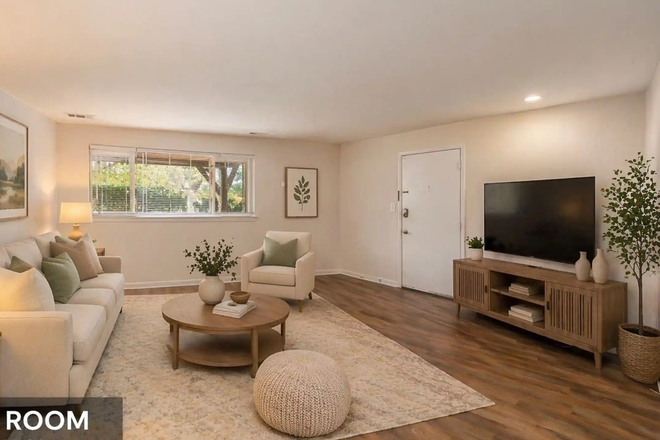 Living Room - Updated 2 Bedroom/2 Bath Apt w/ Balcony 10 mins from University
