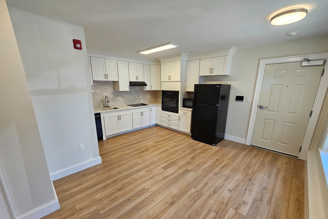 Kitchen - Laundry Included! September 2024 - One Bedroom Apartment at Center East Commons!