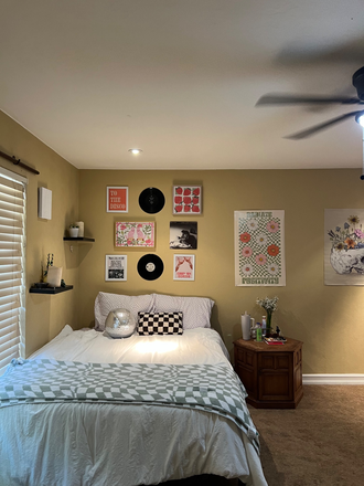Bedroom has been painted white, and new gray carpet - Manana Townhomes