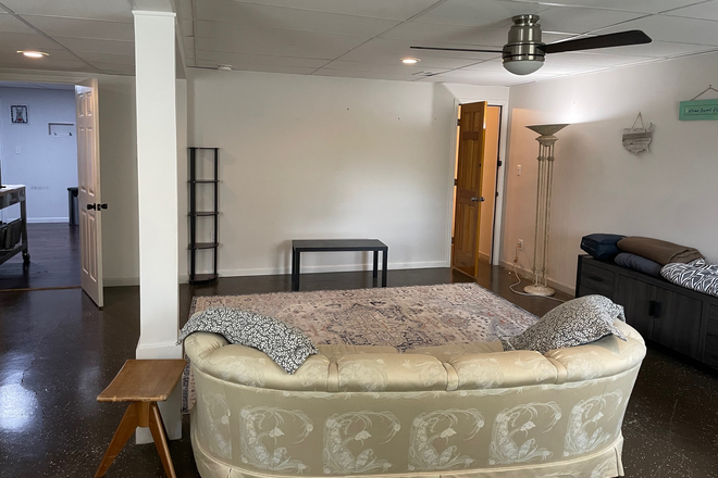 Living Room - Fully furnished, large, studio apartment, quiet park like setting, waterfront.