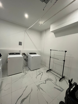 laundy - 248 W 35TH SUBLEASE ROOM Apartments