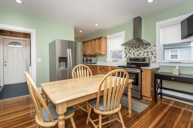 Kitchen - Live Luxe: Prime Location, Modern Comforts, and Garden Serenity Apartments