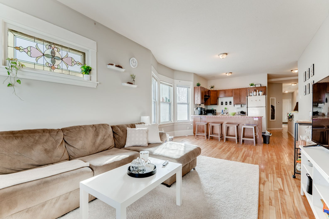 Living room and dining room - 1846 Laurel: 4-bed 2-bath 2-level apt #1