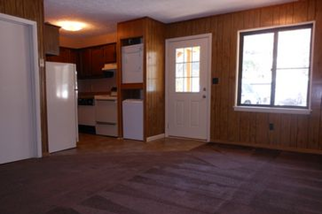 Livingroom to Kitchen - Pebble Creek Apartments