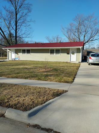 Street view - Quiet two bedroom duplex apartment with large fenced yard.