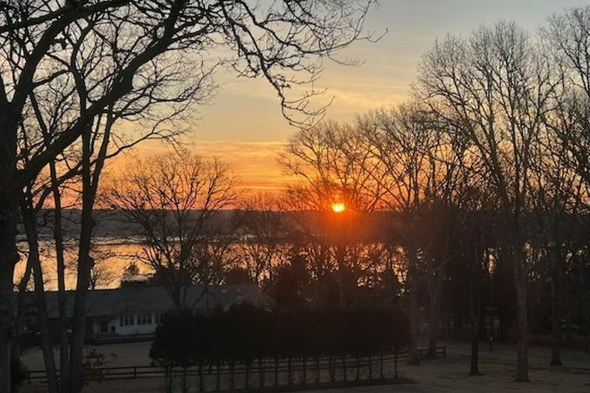 view of sunrise from the bedroom window - Charming Fully Furnished Cottage with River Views – Westport, MA Apartments