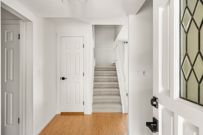 Entry Way (hardwood floors downstairs and new carpet upstairs) - 5 Bedroom 3 Bath Home Available