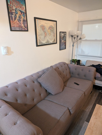 Living room - Crestview apartments, Looking for a roommate, walking distance to campus and on bus line