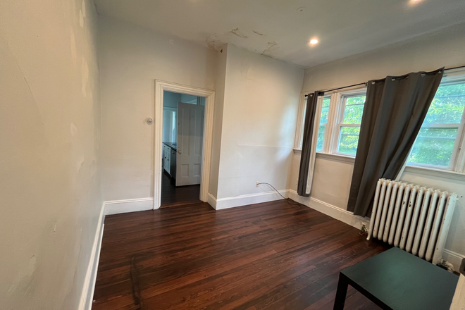 Living room - No Broker’s Fee!  Up to 5 Bedrooms available in a large 5 Bedroom Apartment Close to Campus.