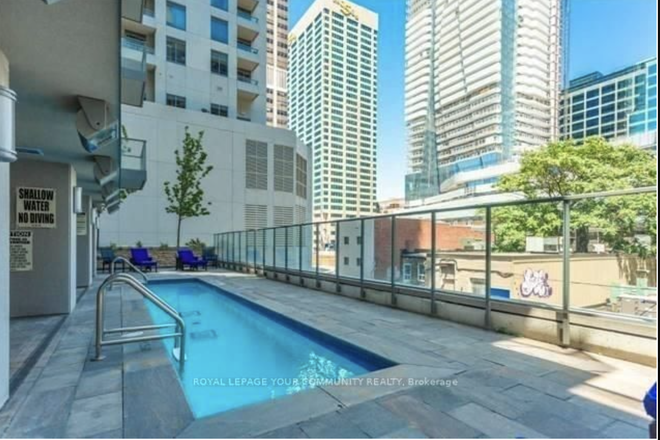 Outdoor pool - Spacious Furnished 1 Bedroom in Yorkville Condo