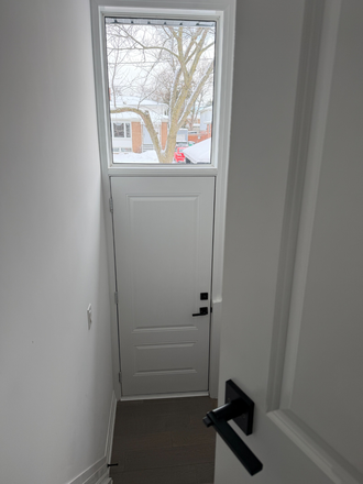 Side Entrance - Bright & Renovated 2BR /1BA Legal Apt w/ private entrances, parking, laundry, backyard space