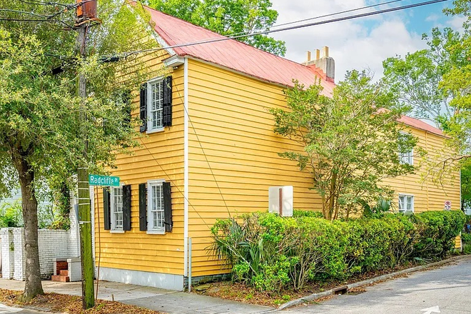 Exterior Side on quiet street - Sunny Condo Close to Everything with Parking!