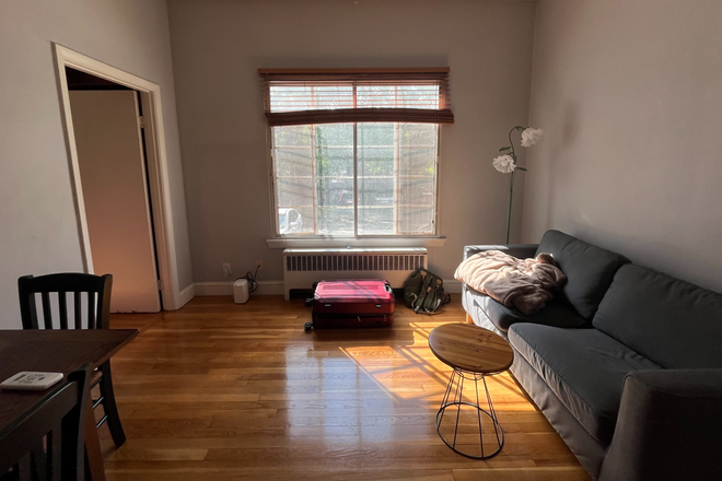 Living room has lovely sun exposure for most of the day - [LEASE TAKEOVER] Furnished Large Bedroom + Office or 2 bedroom flex - 5 minute walk to campus Condo