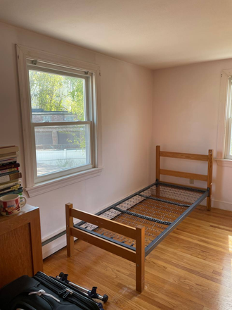 Bright and spacious bedroom with large windows. - Private Room Near BC - Quiet Home with Free Parking & Laundry