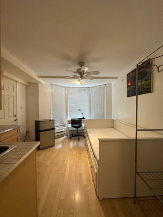 Bedroom with large window - One bedroom studio, steps to UofT, private bath, utilitie & internet incl, free in house laundry