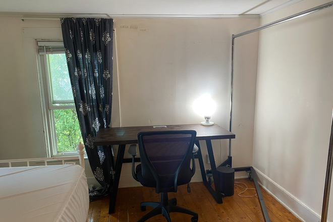 The windows face east and north - Furnished BR, renovated apt, walkable to campus, heat & parking included