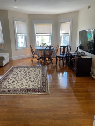 living room - HUGE 4 Bedroom apt.in a great BC building! Parking,2 baths, walk to class! Steal it!