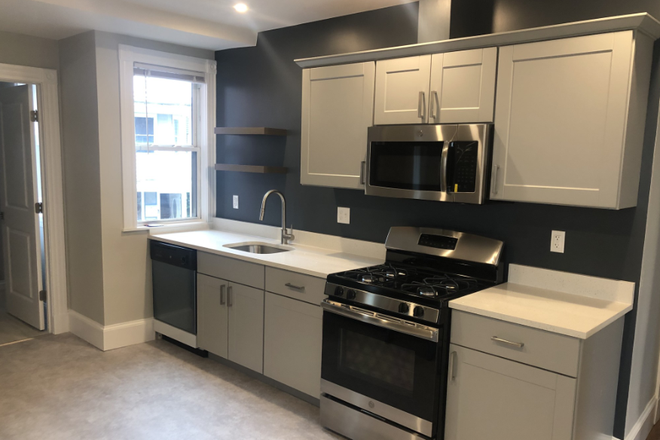living - LOCATION!! RENOVATED 4 BED WITH IN-UNIT LAUNDRY! NO BROKER FEE, 9/1/26!