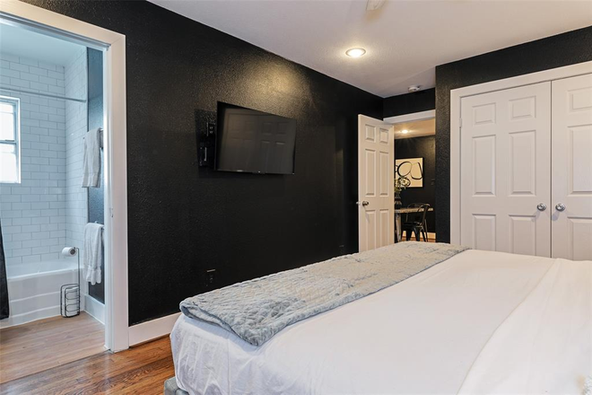 Bedroom with large closet - STYLISH one bedroom unit, close to campus available August 18 Apartments