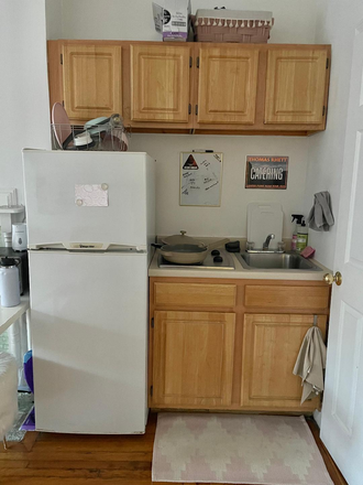 Visit hubrealtyproperties.com - Bright studio, in a great location on the green line T Apartments