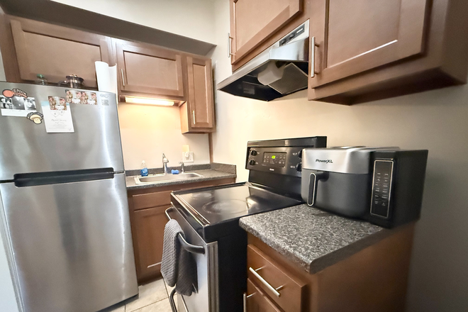 kitchen - Sunny Washington Square studio with updated kitchen - NO FEE! Apartments