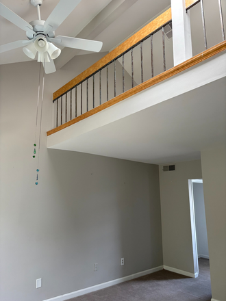 View from living area up to loft - McLean Gardens Studio Loft