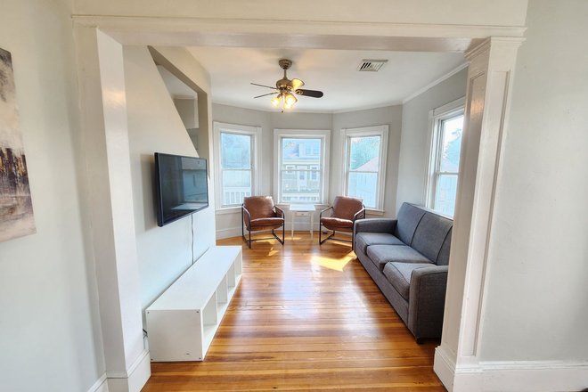 Living Room - Private Room, 15 Minute Walk to Brown, All Utilities Included, TV in Room Apartments
