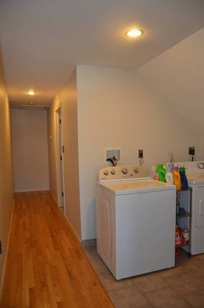 Laundry room - Beautiful sunlit huge apartment with front and back porch.