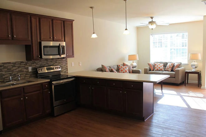 Kitchen and living space - Single bedroom avail in 3 br townhome - walking distance to Centennial campus
