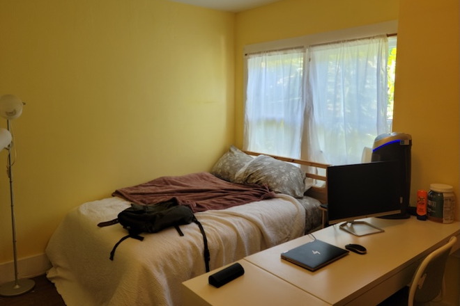 Bedroom looking toward east facing window - Share house on South side, 10 minute walk from campus, furnished bedroom w/ private half bath