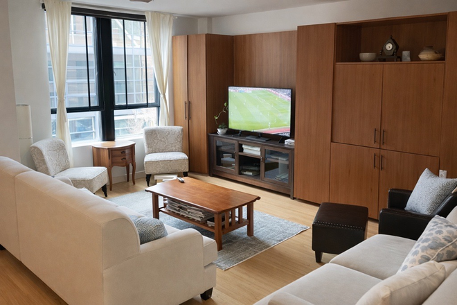 Living room - 2BD/1BA | 1,200 Sq Ft Loft | W/D In Unit | 2 Garage Spots | Storage | 2 Min to Heath St T