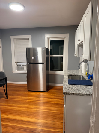 Full Eat-in kitchen - Fully Furnished Rooms Near UMass Boston-Utilities Included Triplex