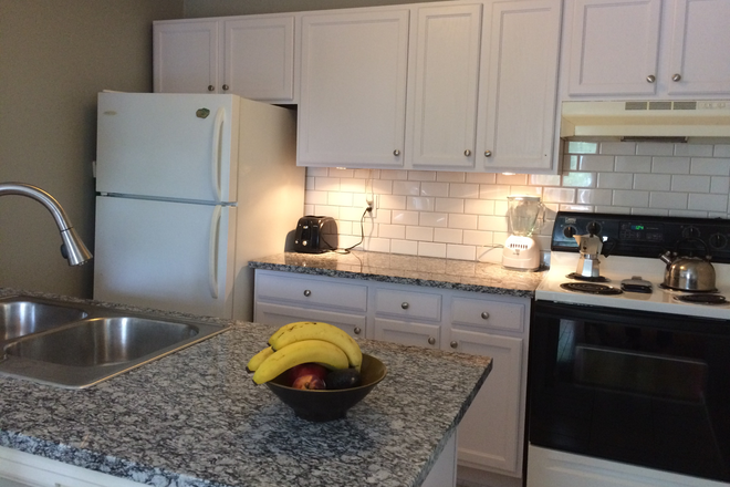 Kitchen - Furnished Bedroom in Beautiful 3Br/2ba Townhome